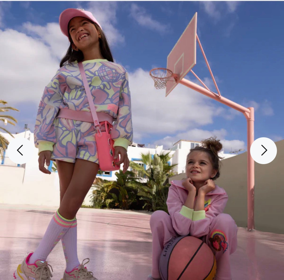 Billieblush girls pastel floral sweatshirt styled with cap and accessories