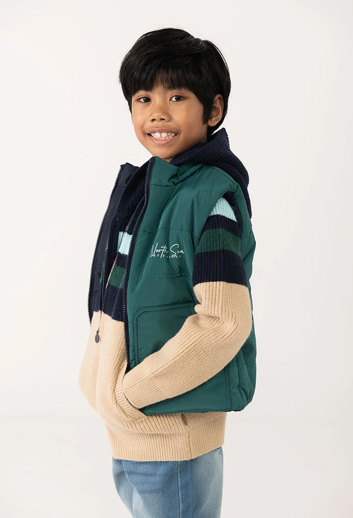Boboli boys reversible gilet vest in green and navy styled over knitted jumper