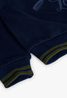 Cuffed hem detail of Boboli Boys Oar Motif navy fleece sweatshirt.