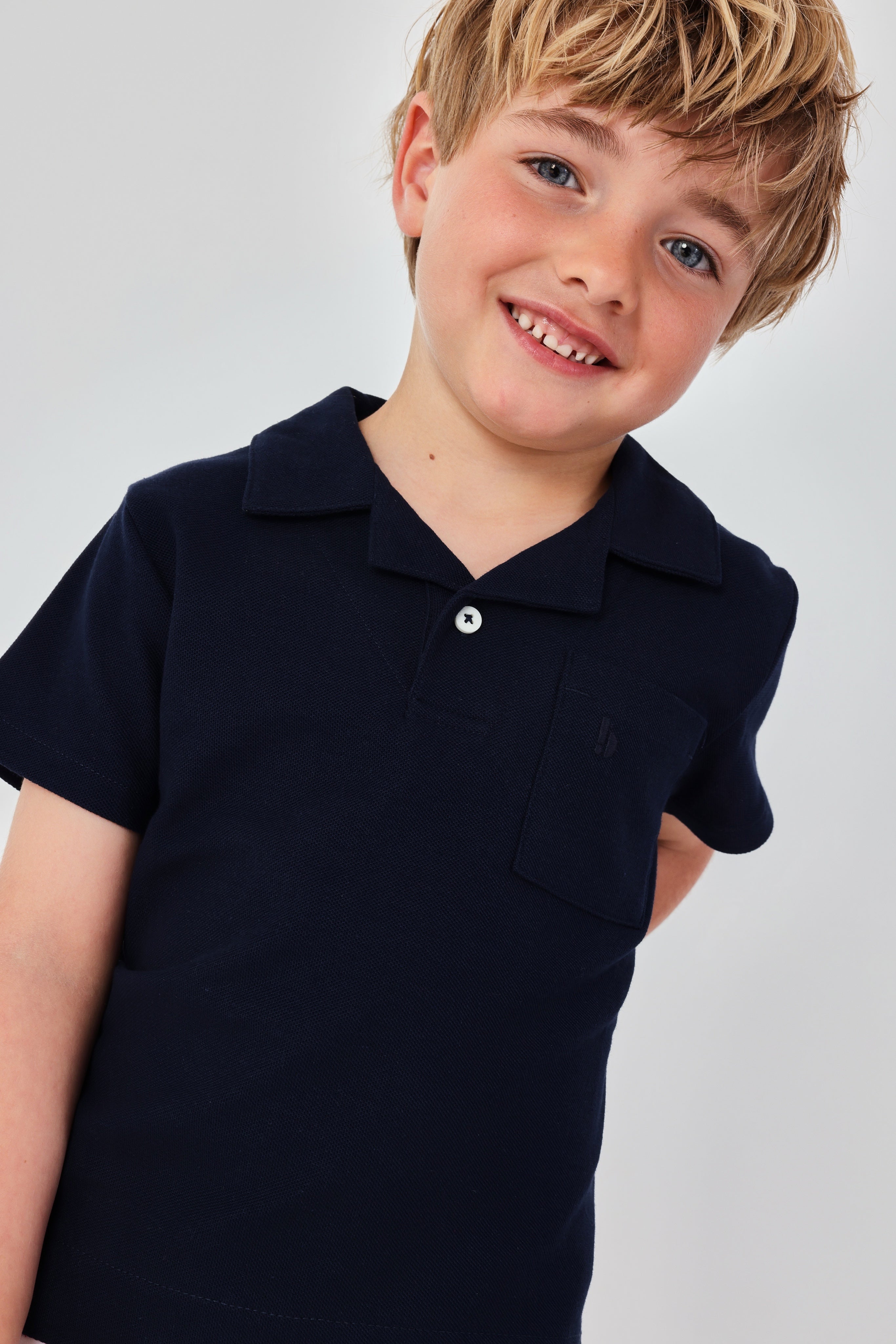 Boboli boys navy polo shirt on child model aged 4 years 