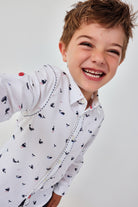 Boboli boys white whale print occasion shirt smiling model view