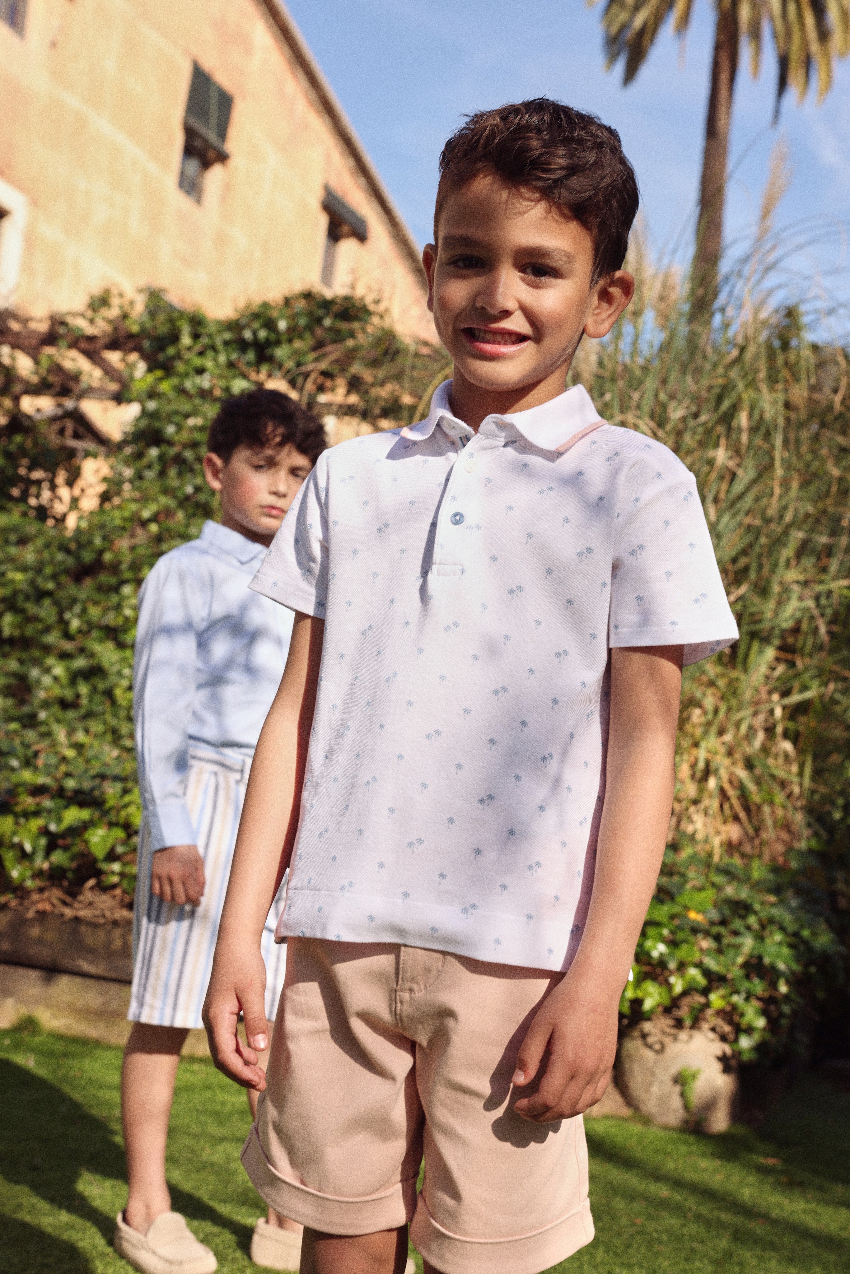 boys palm print polo occasion shirt lifestyle image garden
