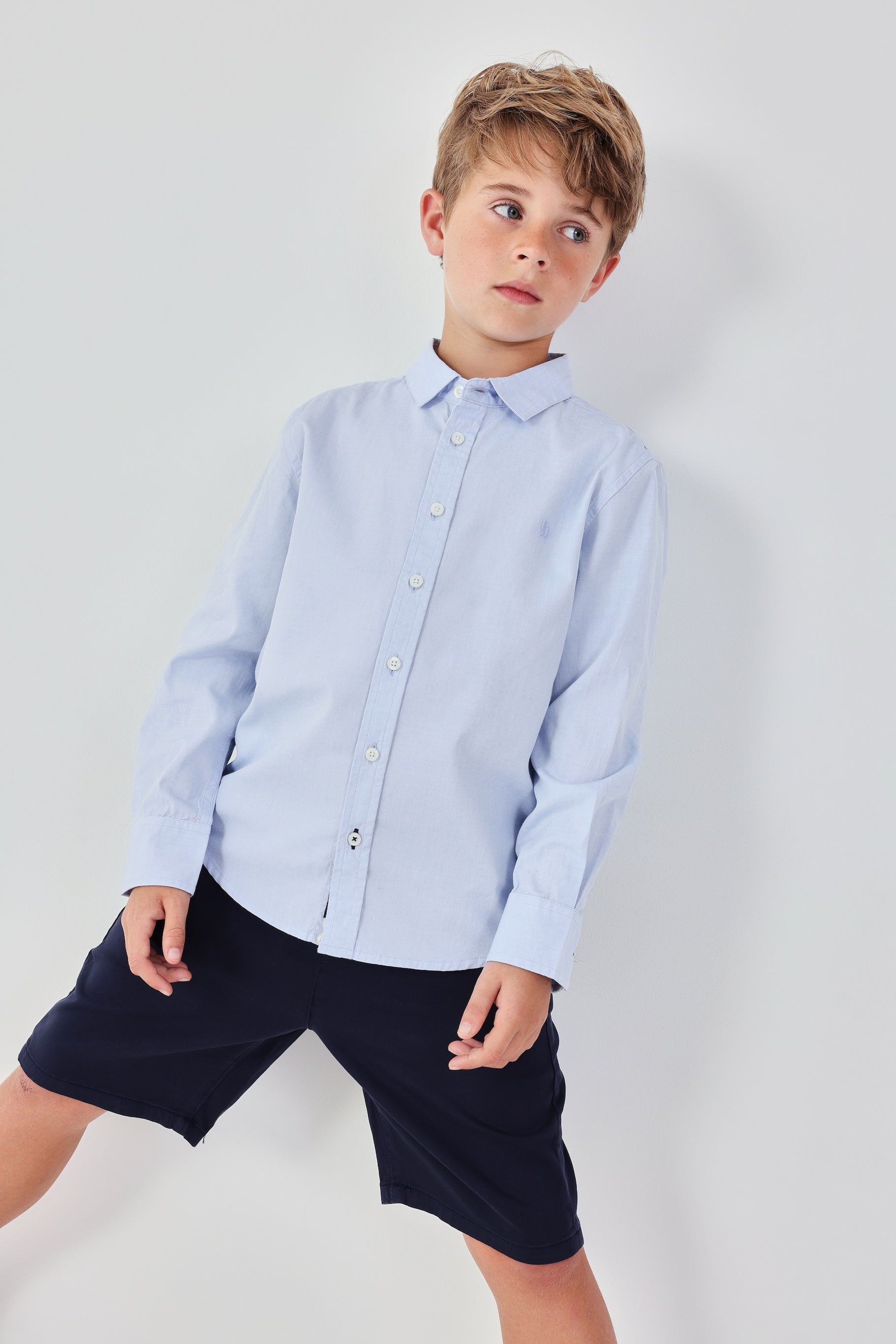 Boboli boys navy occasion shorts styled with shirt