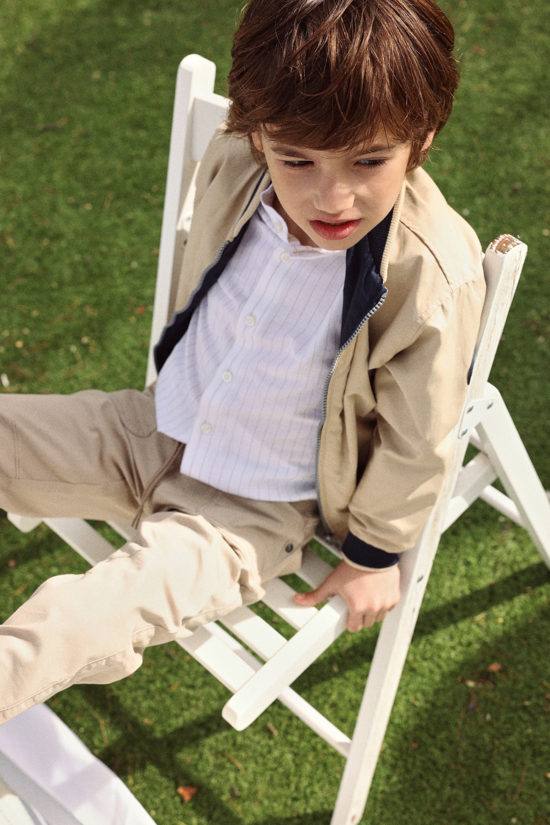 Boboli boys beige bomber jacket outdoor outfit Worn by boy aged 8 years 