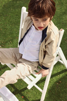 Boboli boys beige bomber jacket outdoor outfit Worn by boy aged 8 years 
