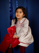 Deolinda Frosty girls Christmas dress styled for a festive occasion