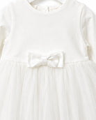 Close-up of the embroidered lace hem on the iDO Mini ivory tulle christening dress