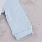 Emile et Rose Matthew pale blue baby boys babygrow sleeve cuff detail
