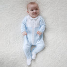 Newborn Baby boy modelling Emile et Rose Matthew blue and white babygrow