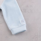 Emile et Rose Monty pale blue baby boys babygrow sleeve cuff detail