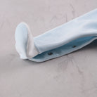 Emile et Rose Monty baby boys velour babygrow white foot and leg popper detail