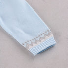 Emile et Rose Milo baby boys knitted romper neckline and button fastening detail