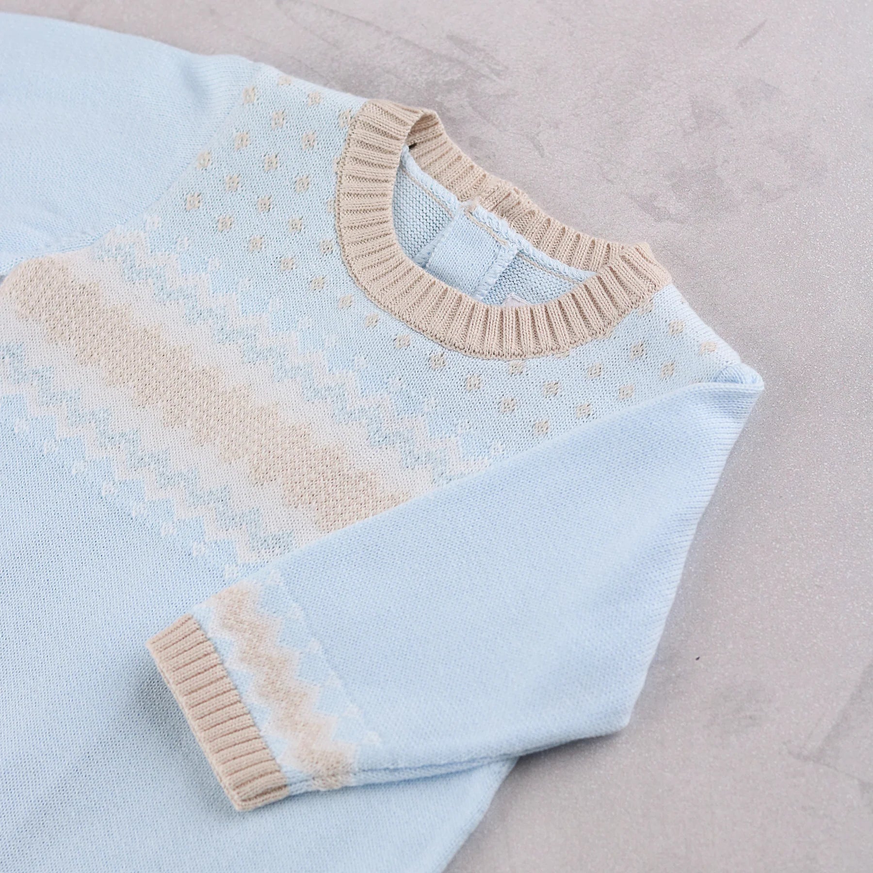 Emile et Rose Magnus baby boys knitted romper Scandi pattern and neckline detail