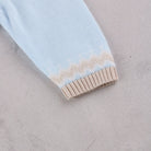 Emile et Rose Magnus blue knitted baby boys romper button fastening detail