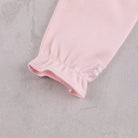 Emile et Rose Madeleine baby girls pink babygrow sleeve embroidery detail