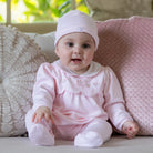 Baby girl in Emile et Rose Matilda pale pink newborn outfit gift set