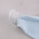 Close-up of Emile et Rose Mason Baby boys embroidered foot detail