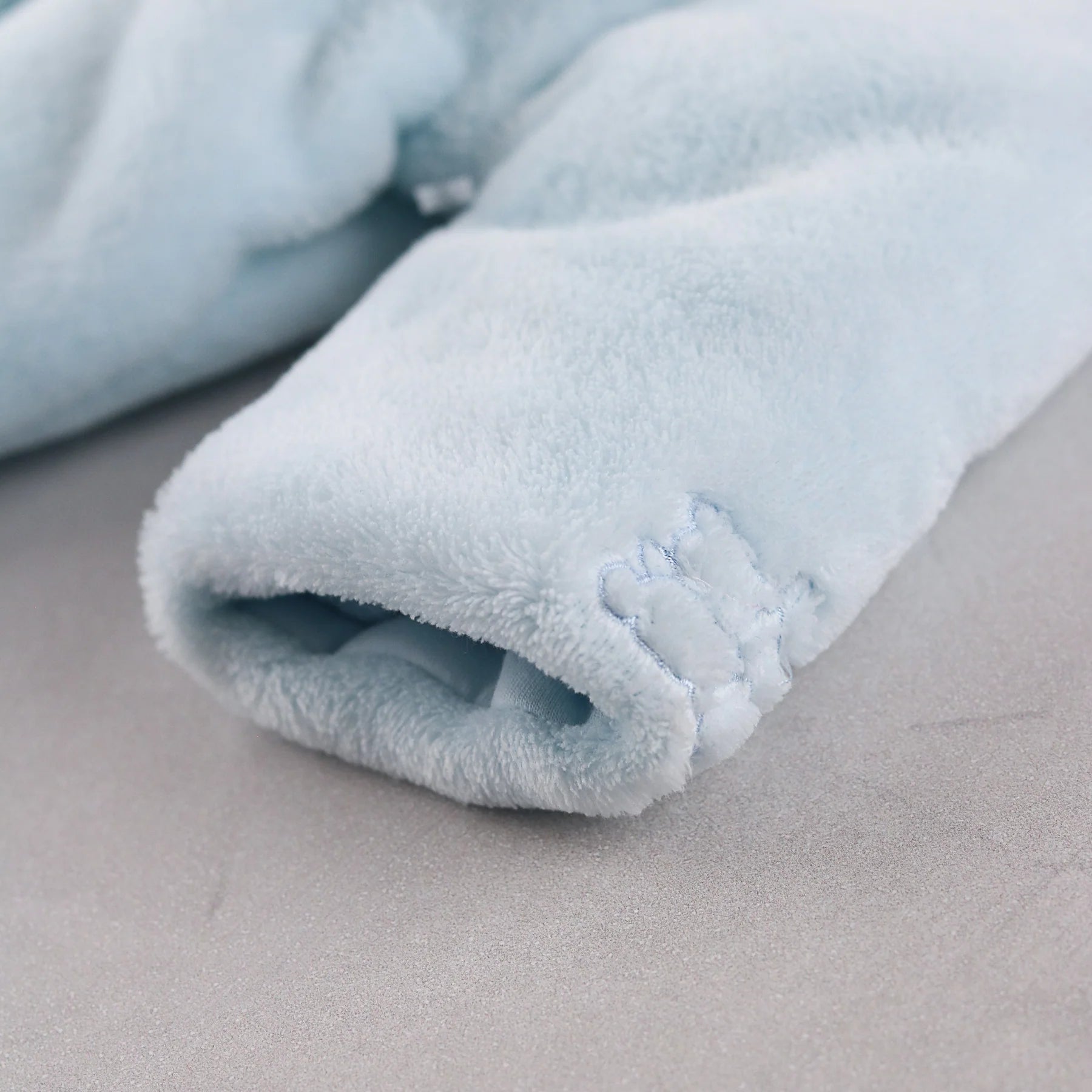 Close-up of the hidden elasticated cuff on the Emile et Rose Axel jacket