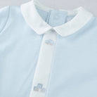 White collar and embroidery detail on Emile et Rose Kent blue boys babygrow.
