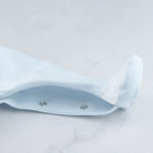 Leg opening poppers detail on Emile et Rose Kent blue boys babygrow.