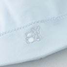 Embroidered toy motif close-up on Emile et Rose Kent babygrow.