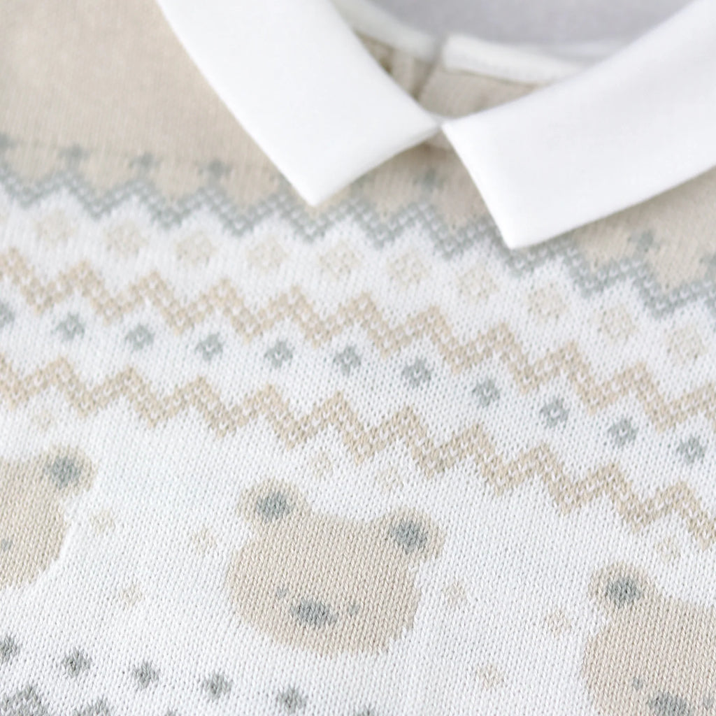 Close-up of Emile et Rose Kipling teddy head and fairisle chest design.