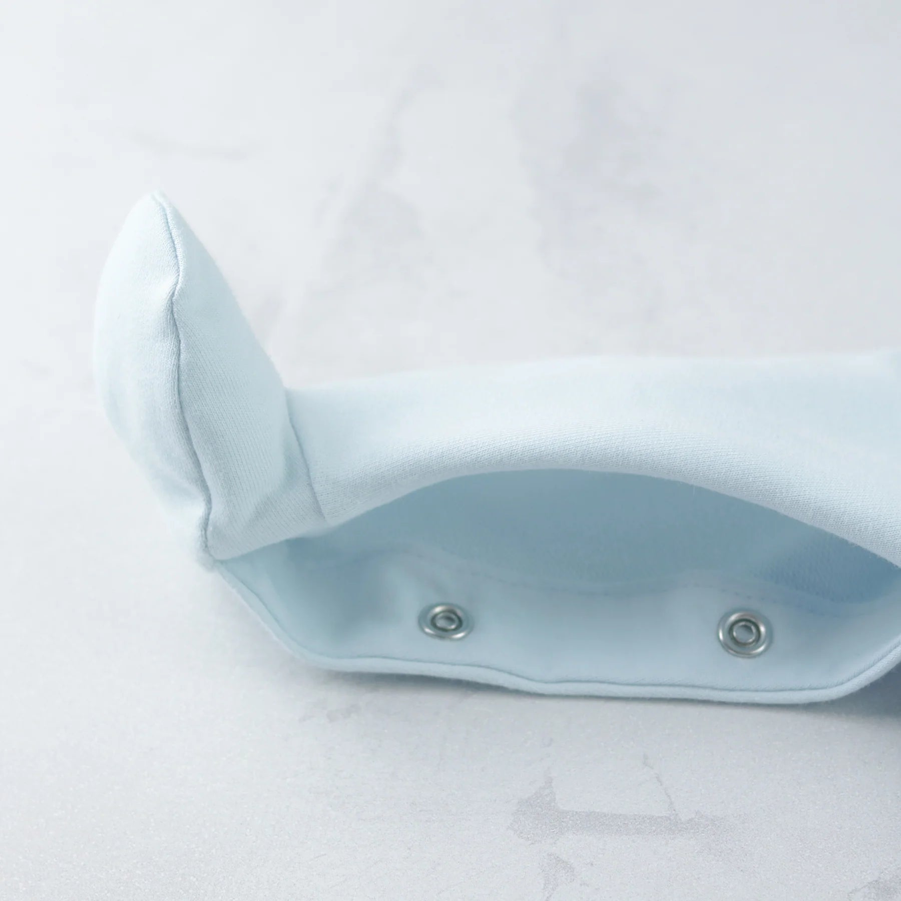 Emile et Rose Kit Blue Teddy Babygrow poppers button fastenings close-up