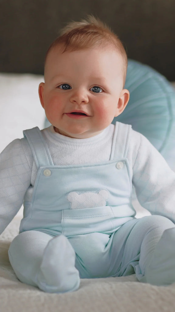 Smiling baby in Emile et Rose Kit Blue Teddy Babygrow outfit Set 