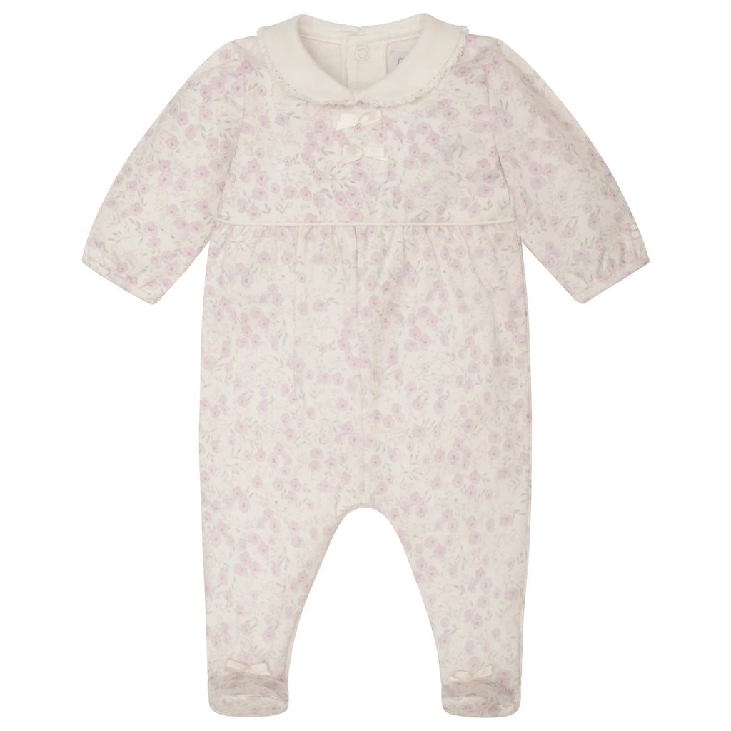 Flatlay of Emile et Rose Kylie girls floral print babygrow with hairband
