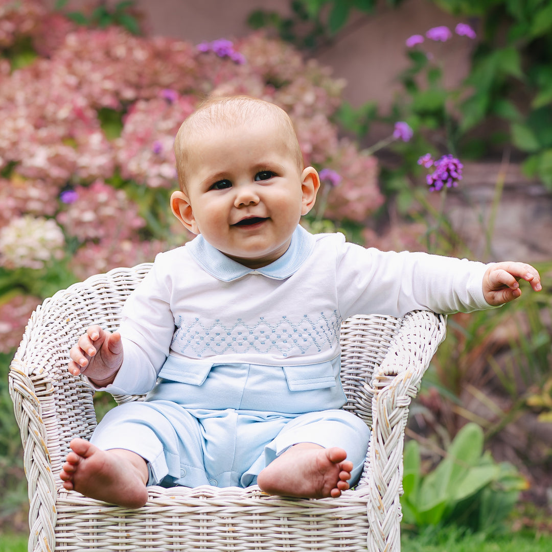 Emile et Rose baby boys blue and white smart babygrow sitting