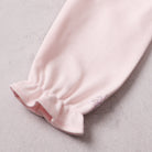 Emile et Rose baby girls pink babygrow sleeve cuff detail