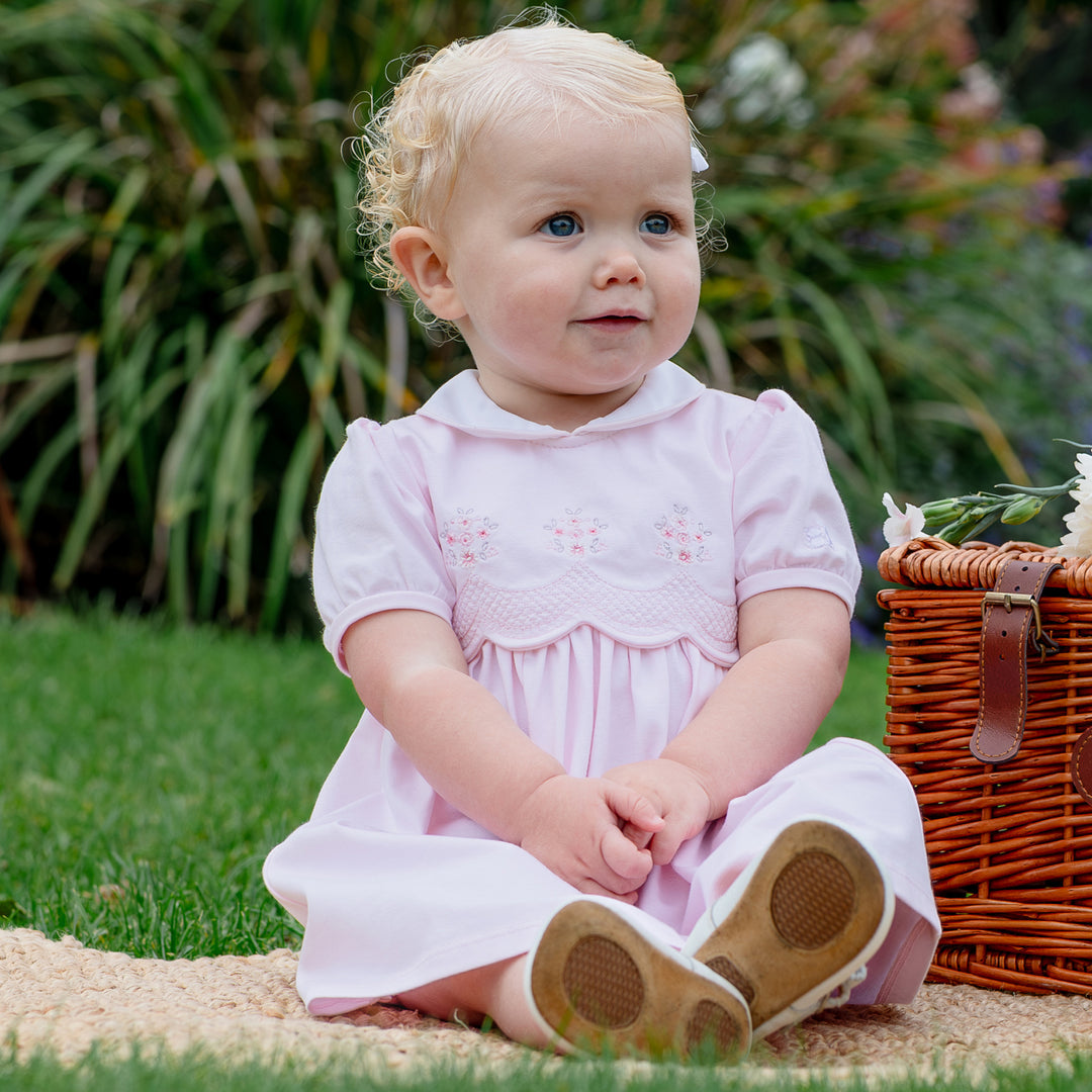 Emile et Rose baby girls pink summer occasion dress worn outdoor