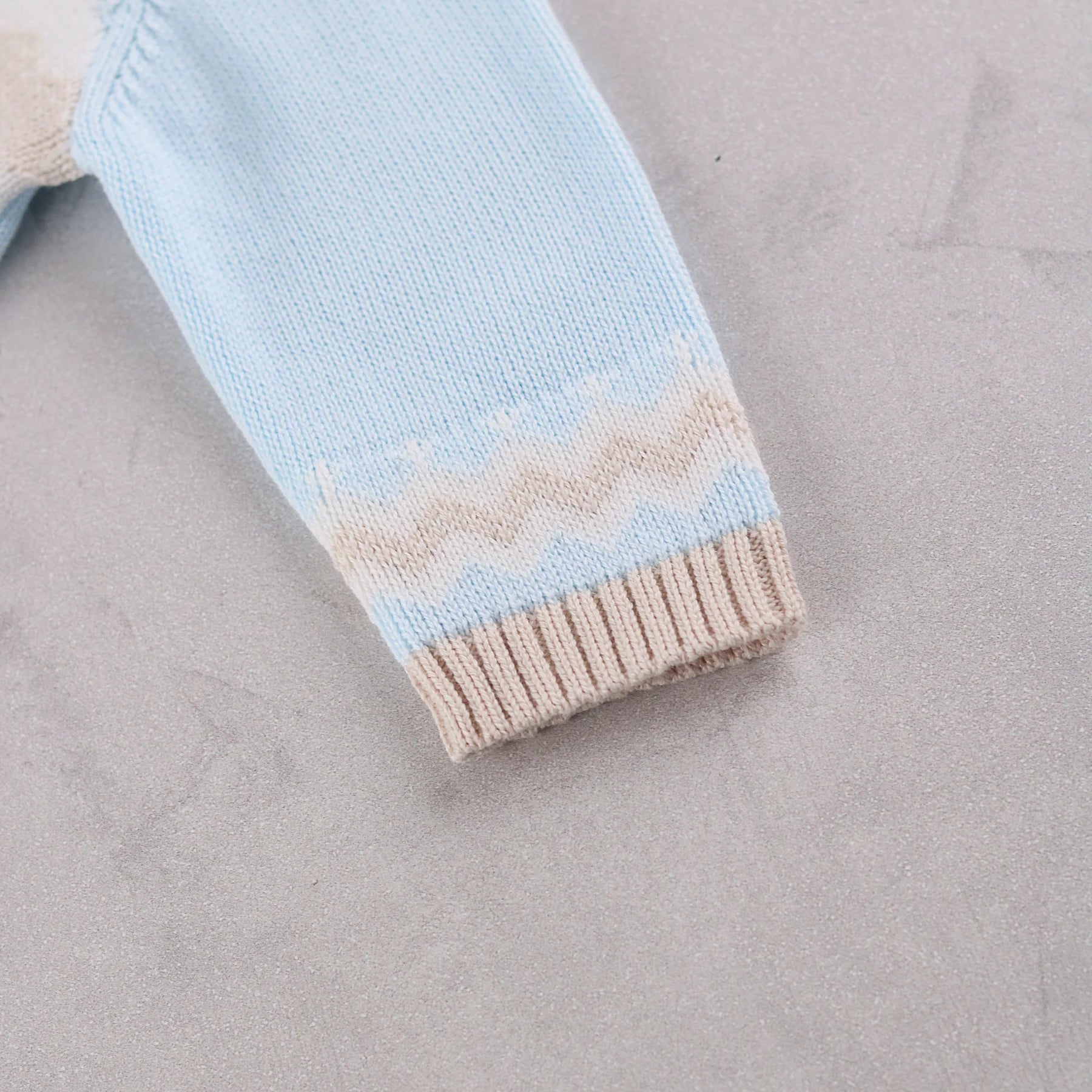 Close-up of Emile et Rose Martin knitted cuff detail