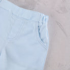 Close-up of Emile et Rose Martin ktrousers with elastic waistband