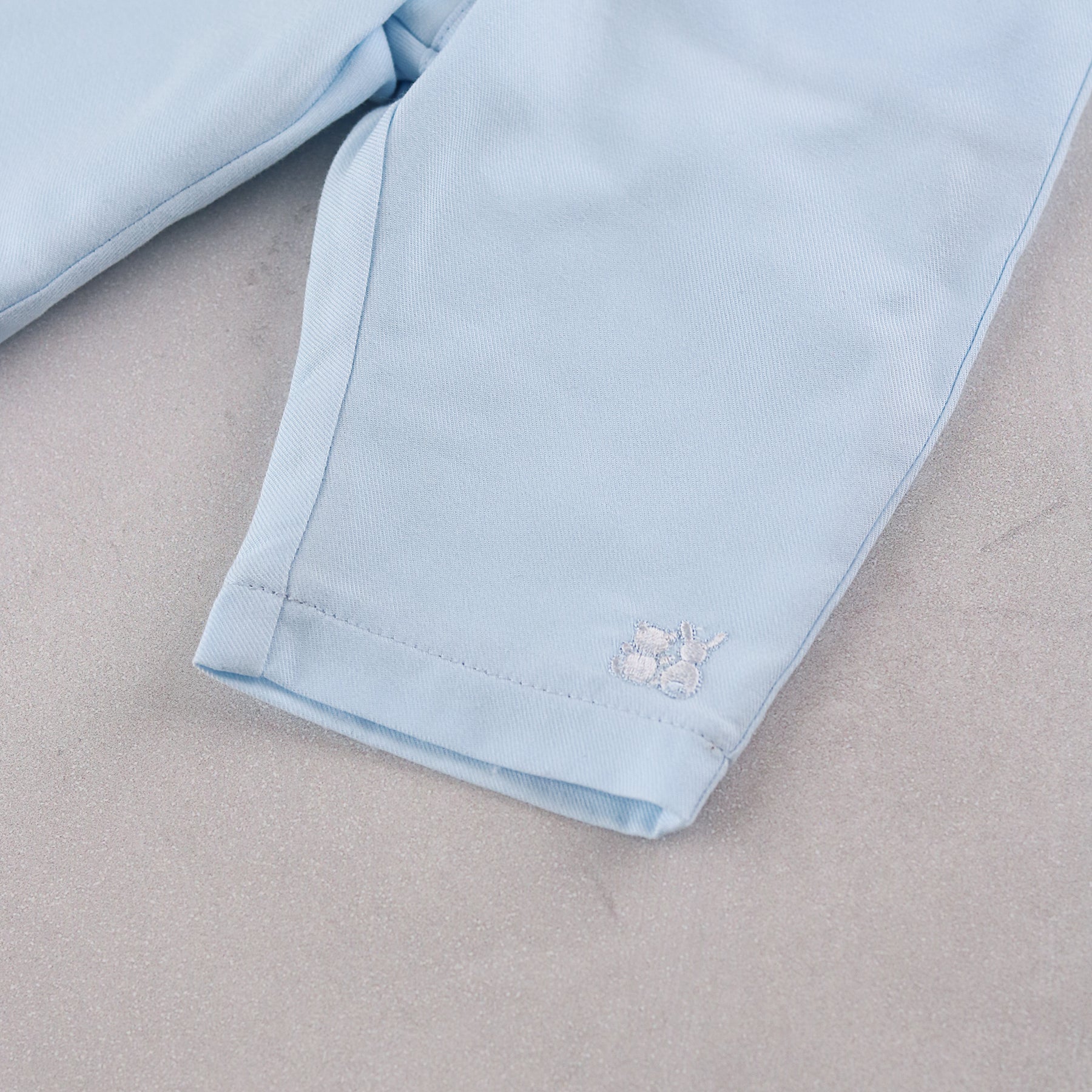 Emile et Rose Martin pale blue baby boys trousers with embroidered hem 