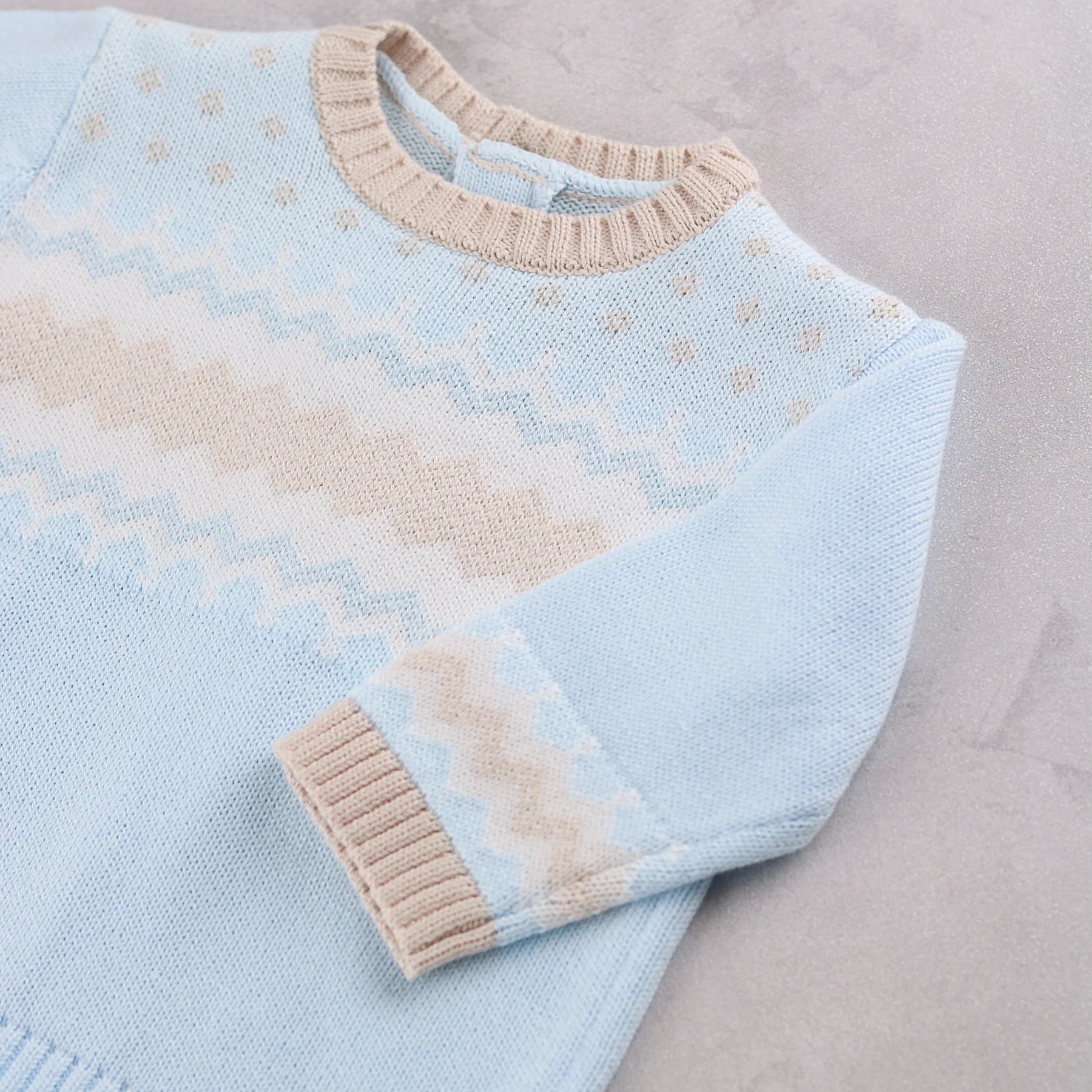 Close-up of Emile et Rose Martin knitted jumper pattern and neckline