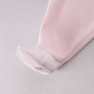 Coordinating pale pink footed leggings from the Emile et Rose Michelle baby girls outfit
