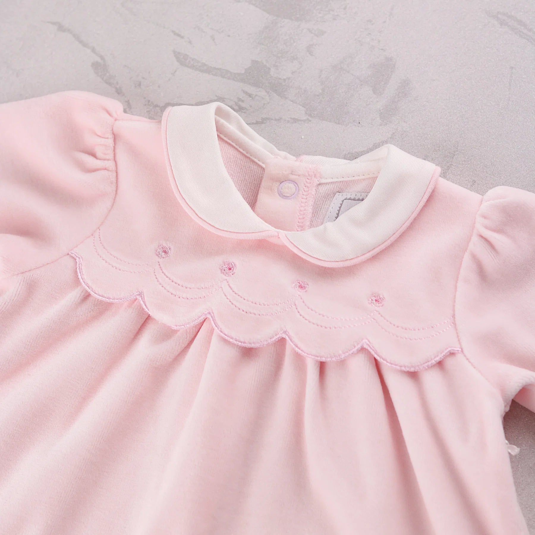 Close-up of the embroidered scalloped yoke on the Emile et Rose Michelle baby girls velour top from gift set