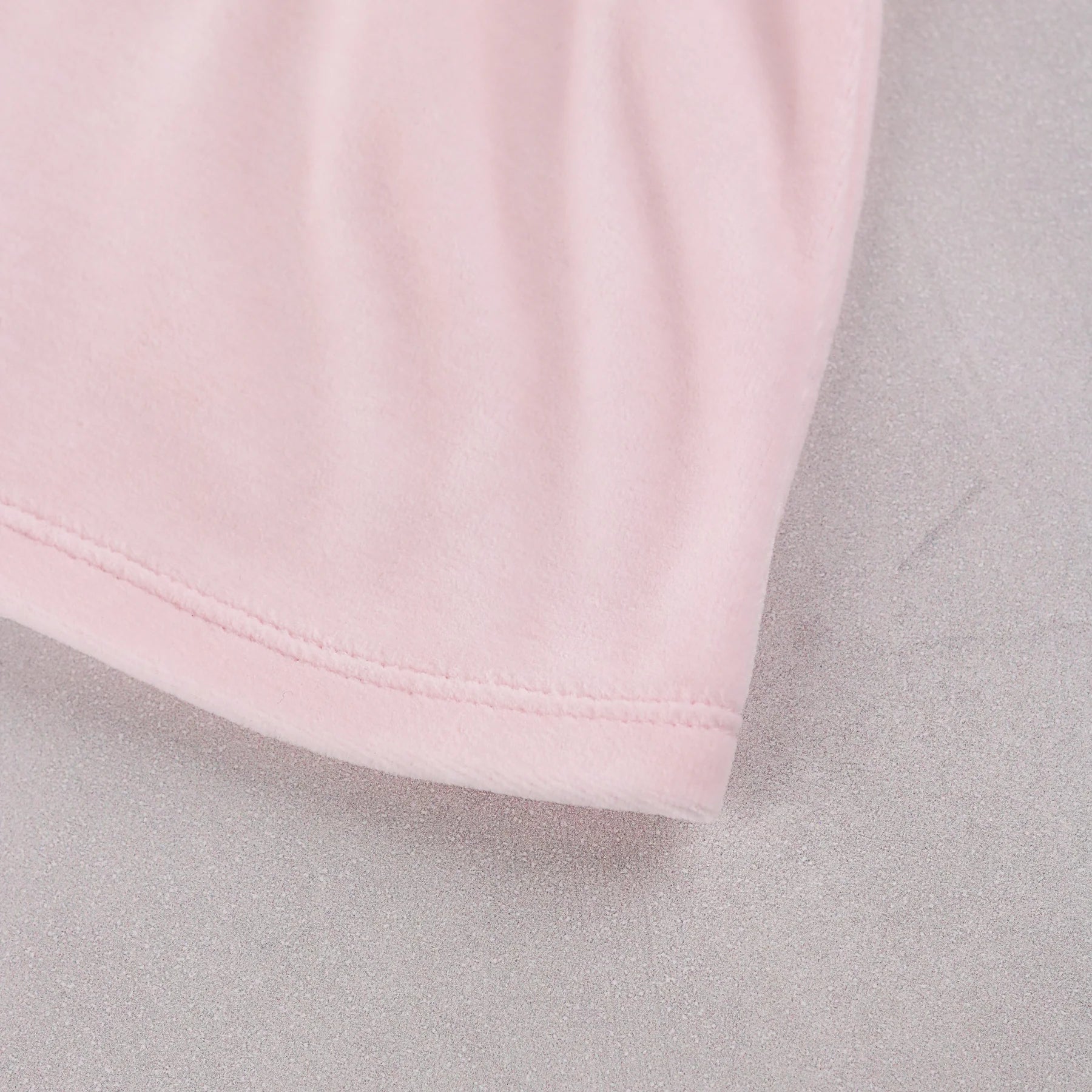 Close-up of the soft pale pink velour fabric on the Emile et Rose Michelle baby girls outfit set