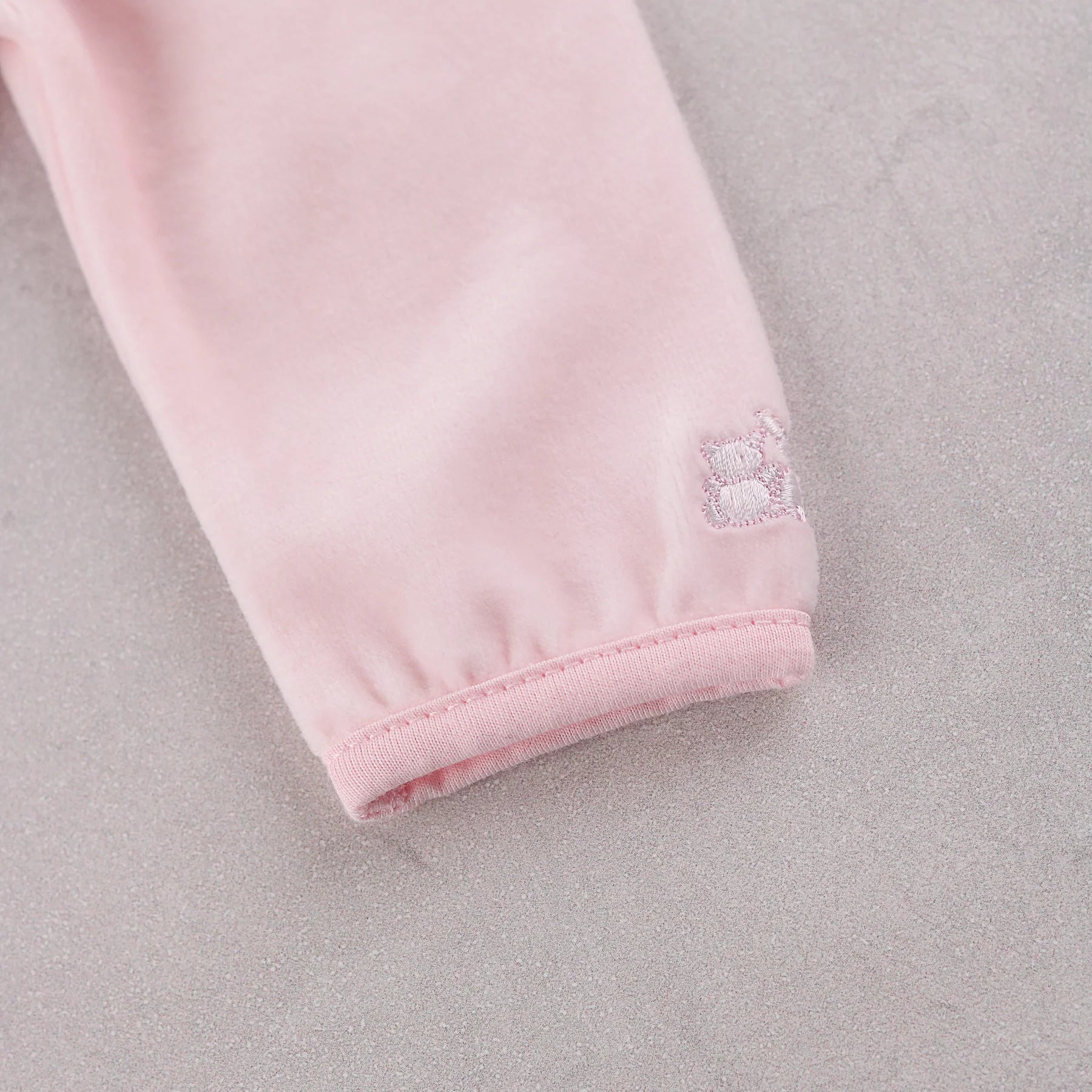 Detail of the bunny embroidery on the sleeve of Emile et Rose Michelle baby girls outfit