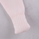 Coordinating footed leggings from the Emile et Rose Minny baby girls knit outfit set