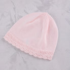 Matching pale pink knitted hat from the Emile et Rose Minny baby girls outfit set