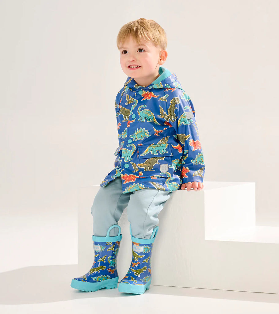 Hatley Boys kids raincoat with dinosaur print and light blue lining
On boy aged 4-5 years