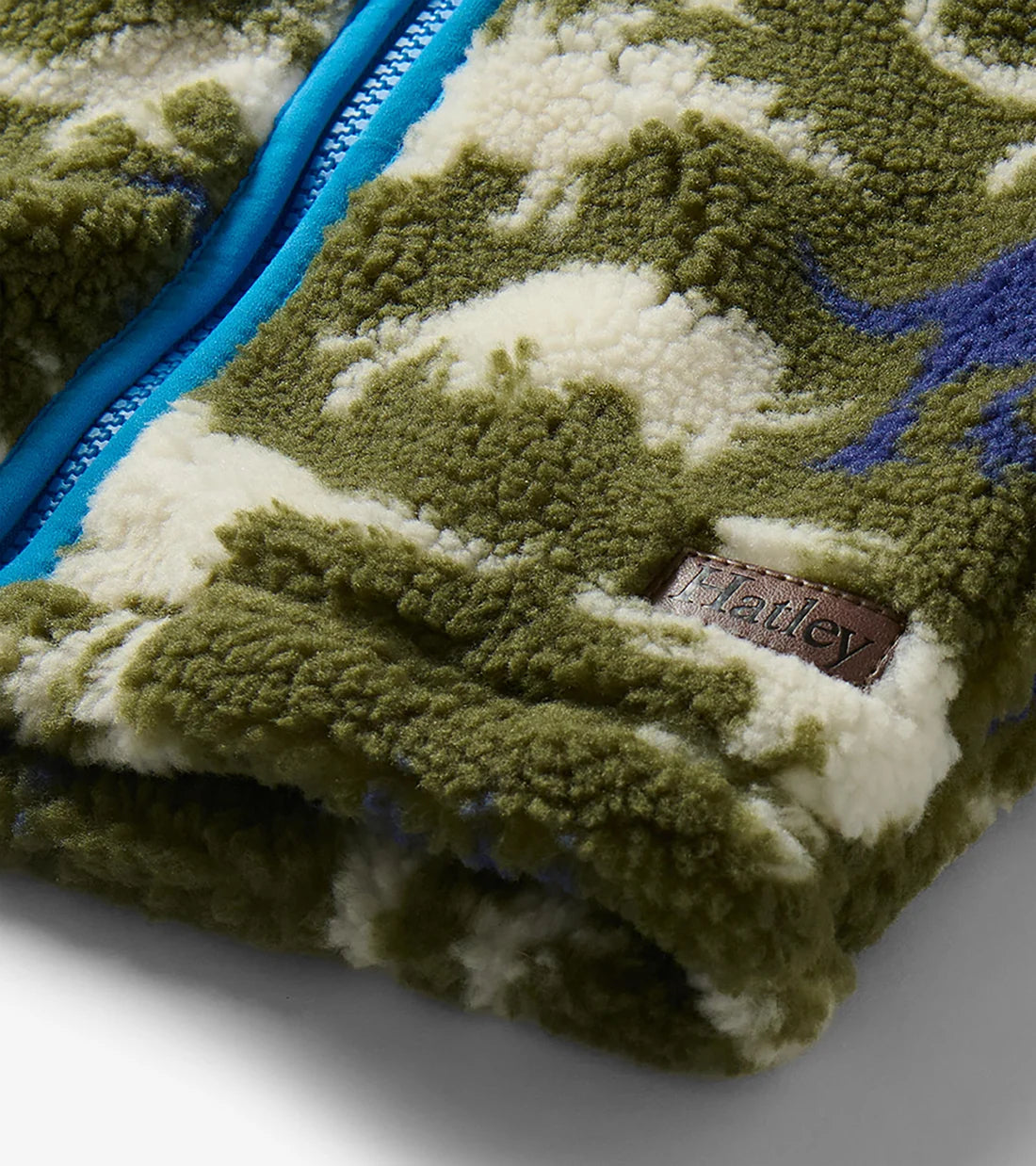     Hatley Dino Silhouette sherpa jacket close-up with blue trim