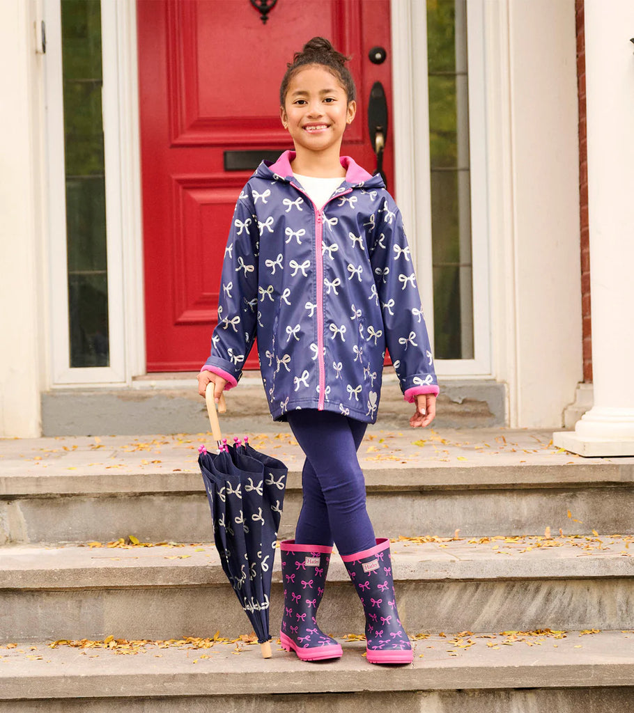 Hatley girls navy raincoat with silver foil ribbon print – girl aged 10-11