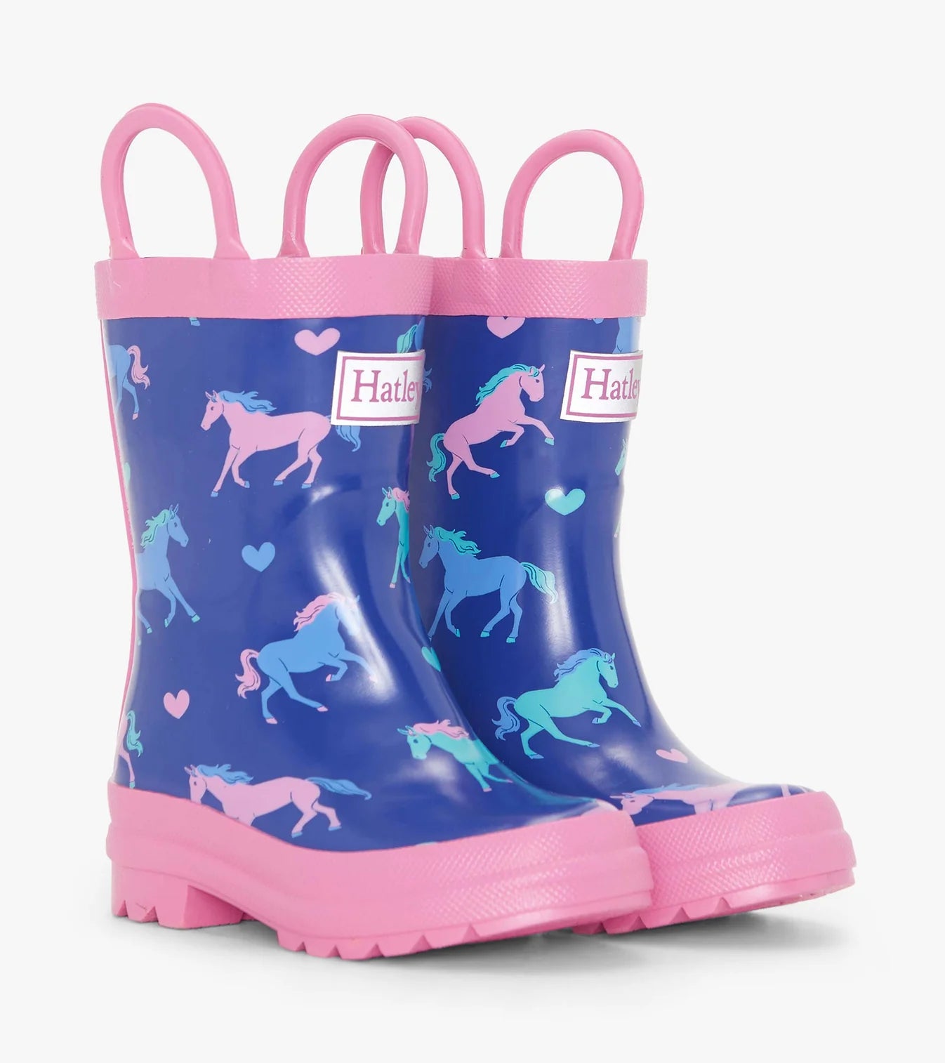 Hatley Hearts & Horses girls rain boots in navy with pink tabs, front angled view