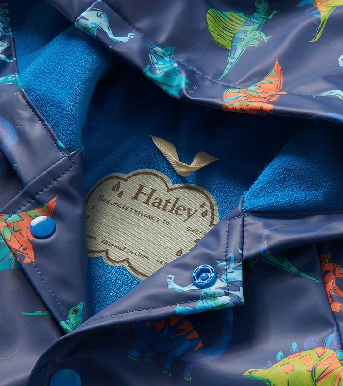 Close up of Hatley raincoat lining blue terry towelling interior