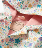 Close-up of Hatley girls raincoat pink terry lining inside hood