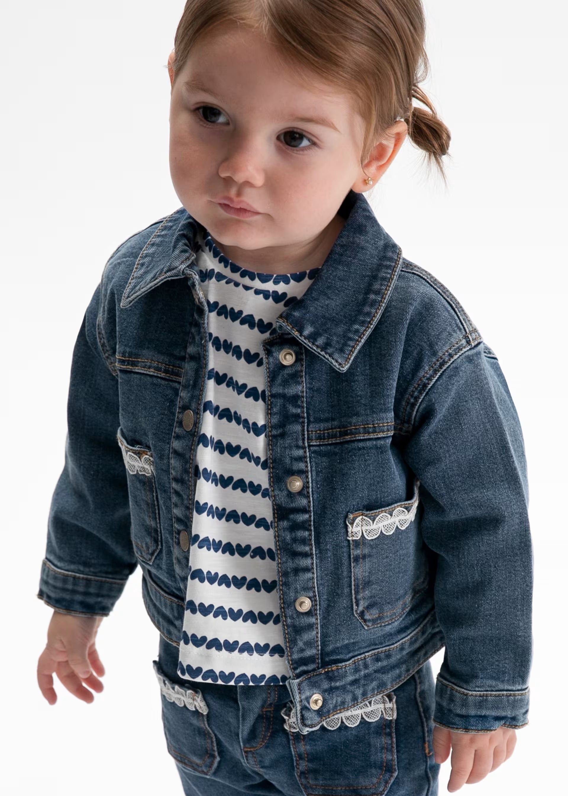 Mayoral baby girls dark wash denim jacket worn open on girl aged 4 years 