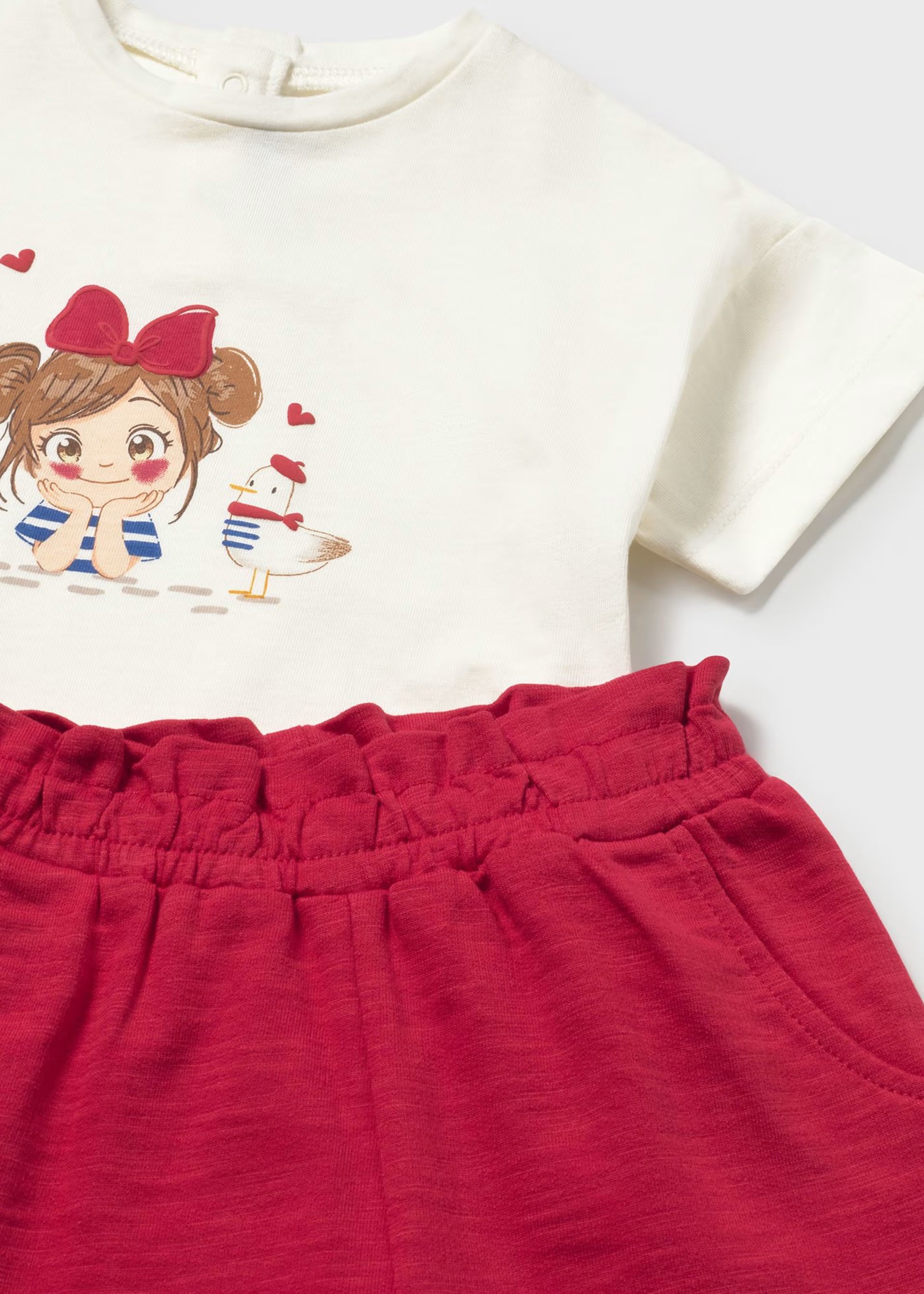 Mayoral girls cream T-shirt with illustrated girl and red trousers detail